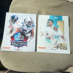 tyreek hill and zach thomas autograph photos