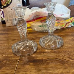 Two Glass Candle Holders With A Swirl Design