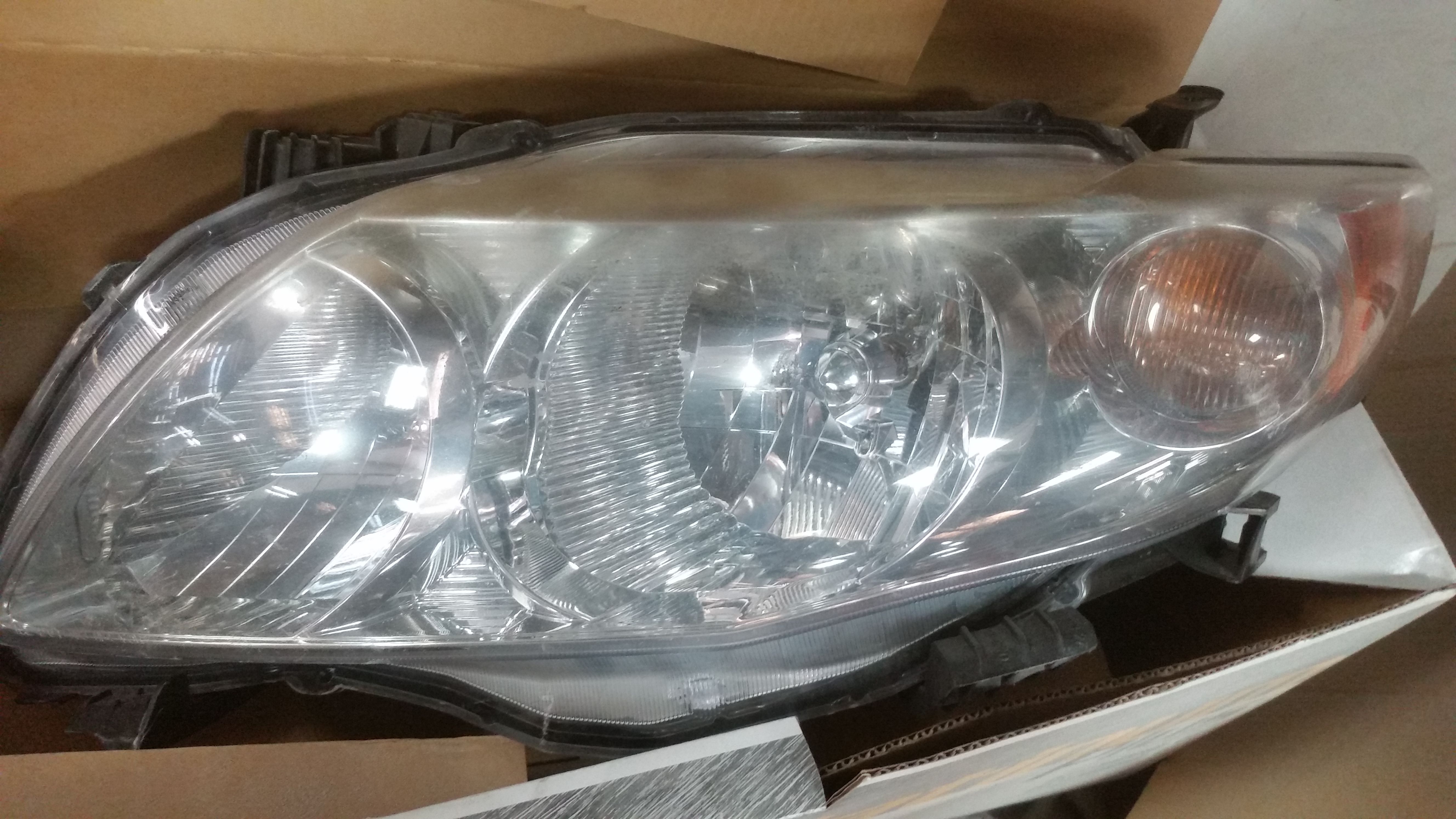 Toyota Camry head lamp left