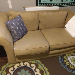 Tan Loveseat