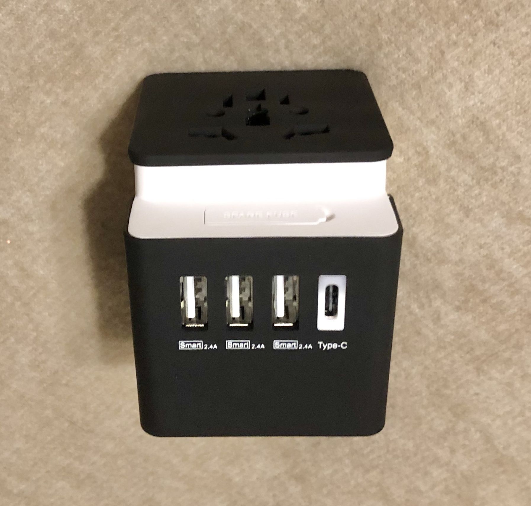 Global Travel Power Adapter with USB Charger Ports (USB C and A for use with Apple iPhone  or Samsung phone, tablet, etc.)