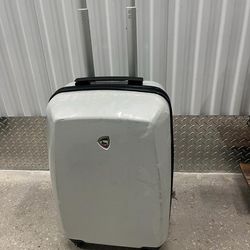 Mia Toro hard shell luggage on wheels.  23 inch carry on. Made in Italy. 