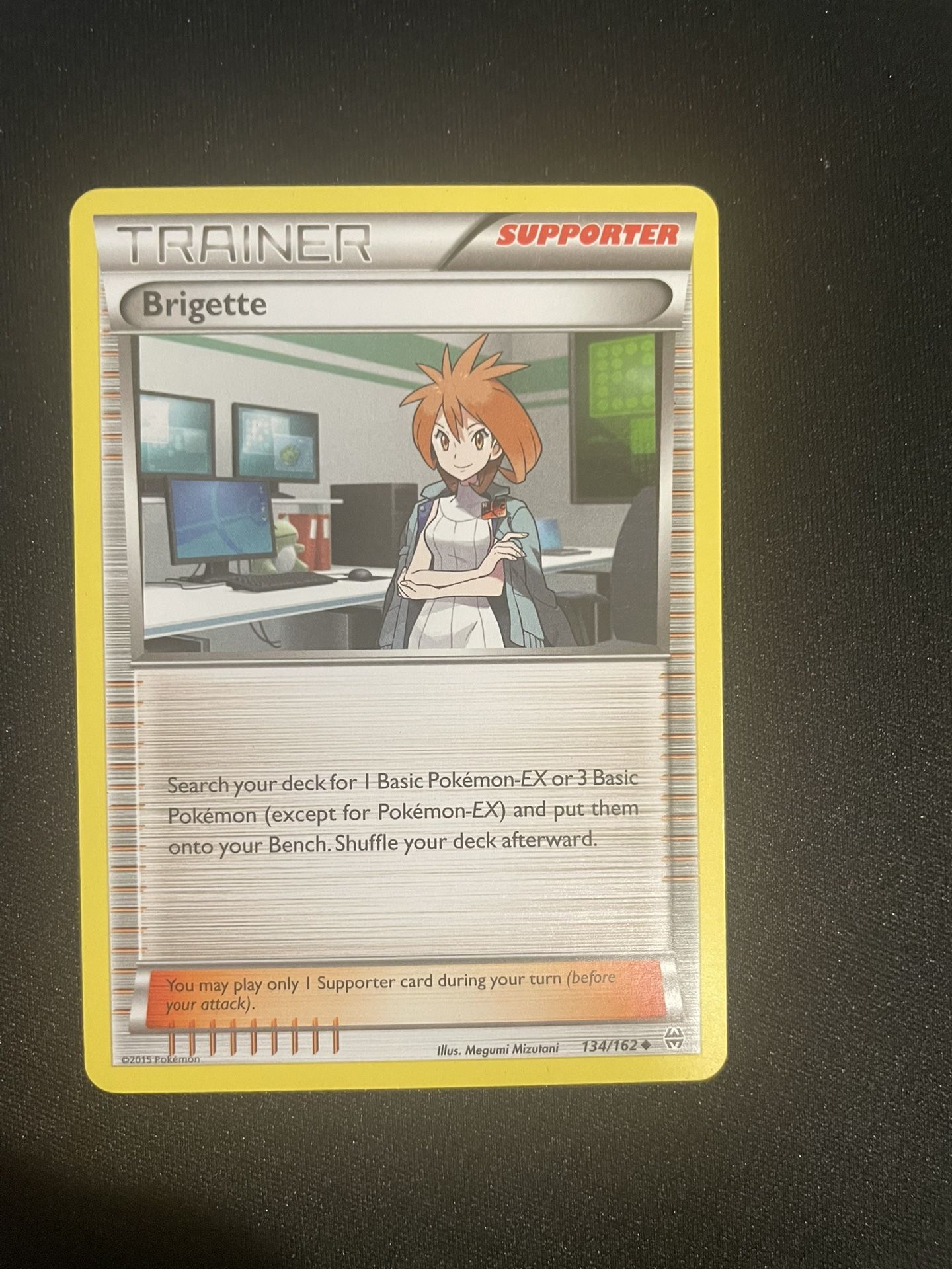 Brigette Pokémon card: Breakthrough- Uncommon - 135