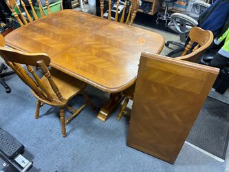 Oak dining table with chairs