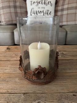 Rustic metal and glass candle holder. Candle not included. 5.00