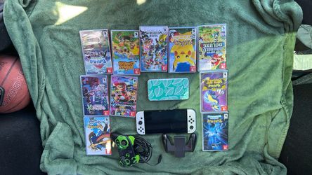 Nintendo Switch OLED Bundle with 10 Games, 2 controllers and a game case