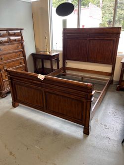 Designer America queen bed frame (in store)