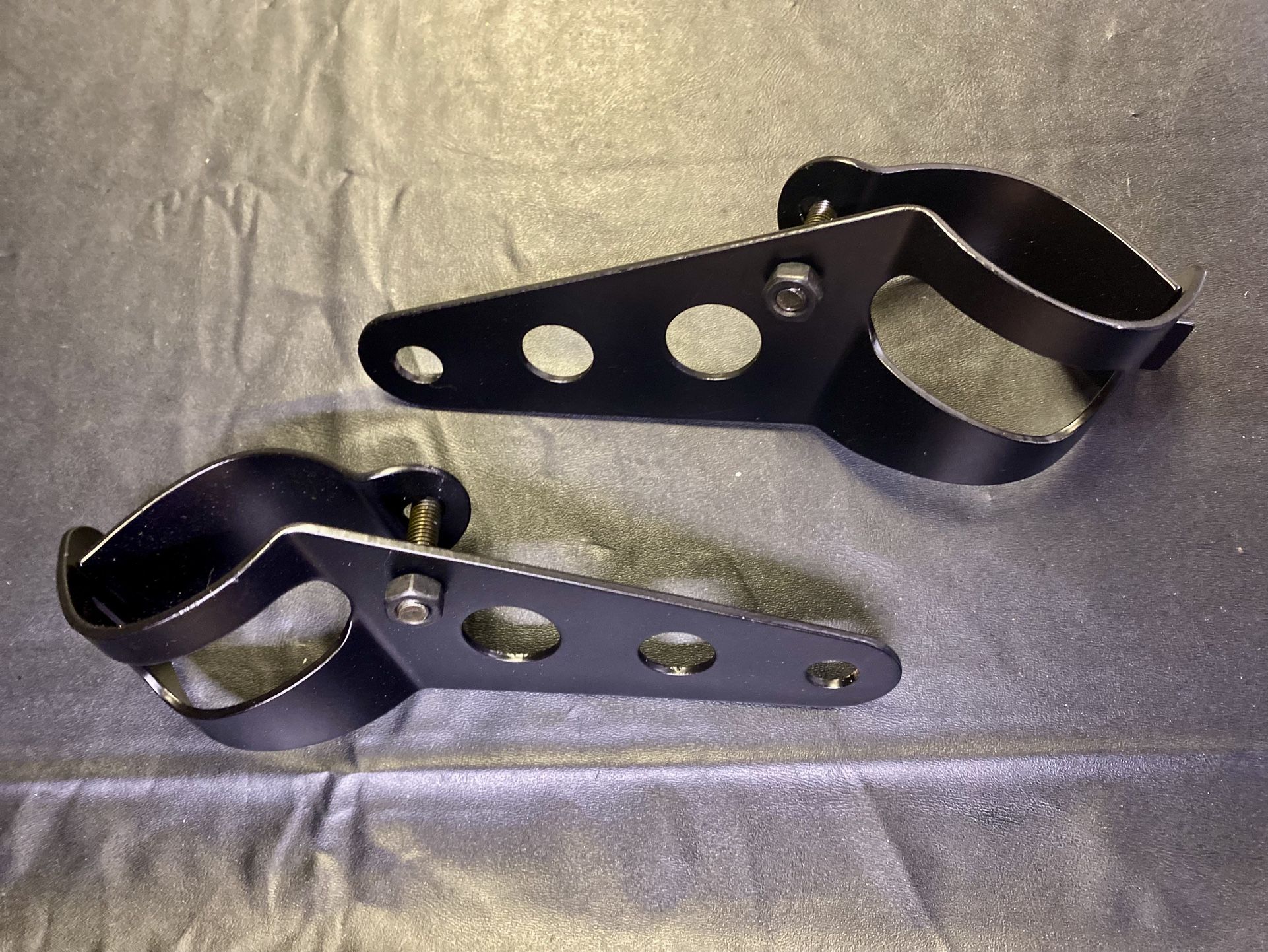 Motorcycle headlight brackets
