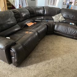 2 Fully  reclining leather couch good condition Need Gone