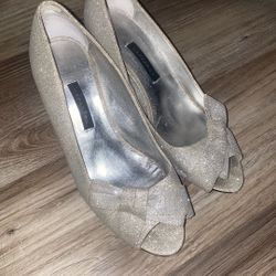 Caparros silver glitter high heels with bow detailing