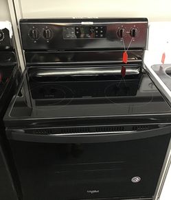 Used whirlpool 5 burner glass top stove. 1 year warranty