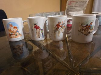 Set of 4 norman rockwall collector  coffee mugs