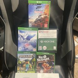 xbox one s + 5 games and  all cables- includes a dual controller charger