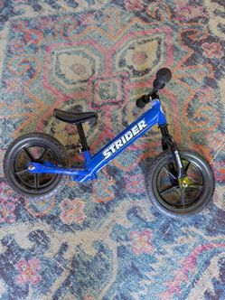Strider balance bike bicycle blue