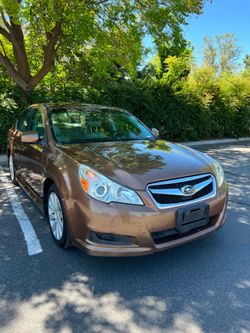 2011 Subaru Legacy AWD.  Miles...158.689.   $3500