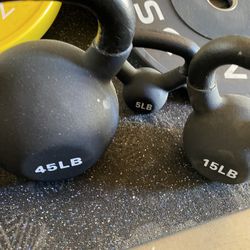 All Brand New  5-50lb Kettlebells 