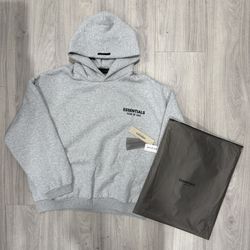 “Light Heather Grey” Fear of God Essentials hoodie