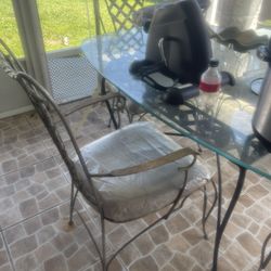 Table, Oval Glass Top Four Chairs. Free