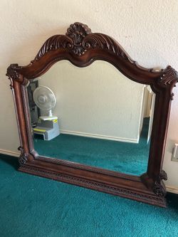 Beautiful heavy mahogany/cherry wood mirror