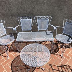 Vintage wrought iron table and chairs for sale sale