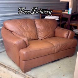 Leather Loveseat See photos and details