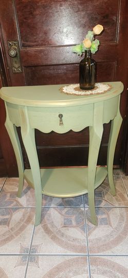 Accent wood  table, sage  green.  Clear finish for protection.