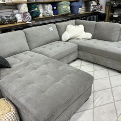 Thomasville Miles Fabric Sectional with a storage ottoman 
