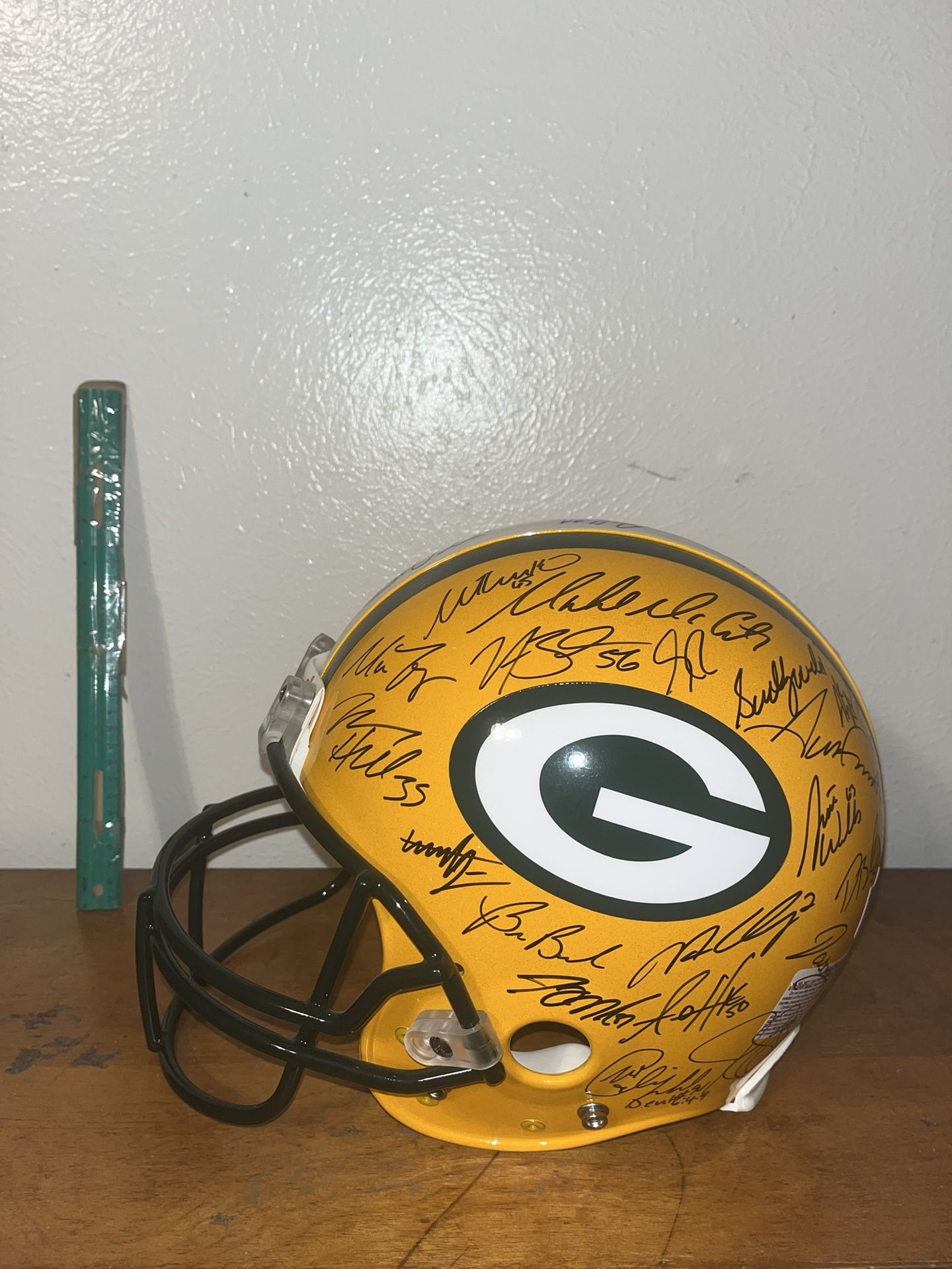 green bay packers signed helmet by Favre & Rodgers & Woodson + others & c.o.a.