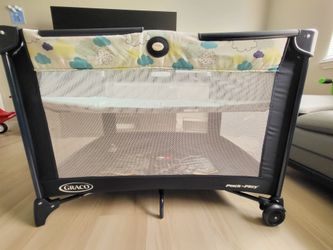 Graco Pack 'n Play Playard. Open box.