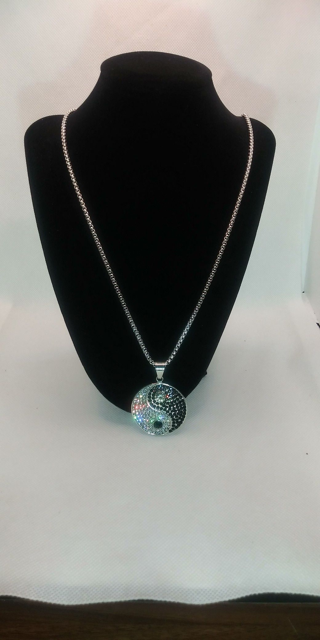 Iced out. 14kt white gold filled 24in rolo chain & yin yang symbol