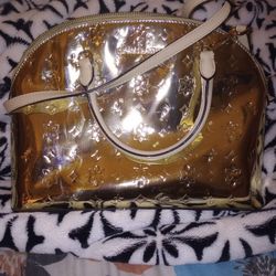 MICHAEL KORS GOLD METALLIC PURSE
