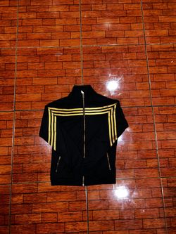 Kid size ten Adidas track top, excellent condition, willing to go lower