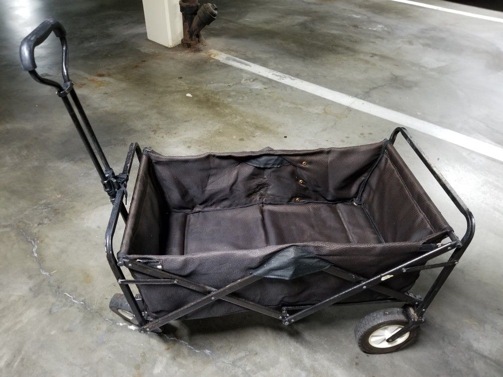 Four wheel basket that collapses and retractable handle 19 by 36 by 20 in tall. Long Beach 90814 cash only