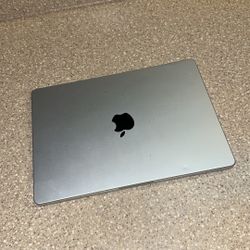 2021 14-inch MacBook Pro with an M1 Pro chip, 16GB RAM, and a 512GB SSD