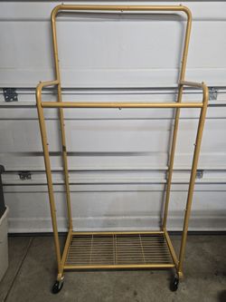 2 Gold garment racks