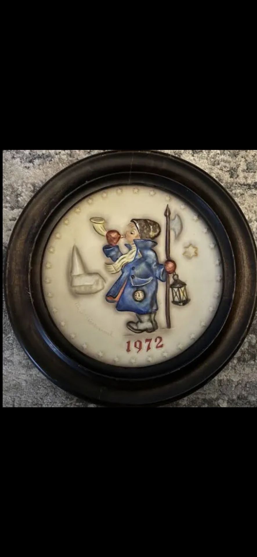Eleven Framed Hummel Plates