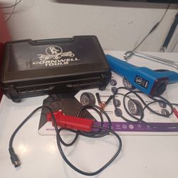 Professional Cornwall timing light with advance, snap on distributor wrenches.