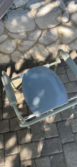 Bed side commode with knee pillow