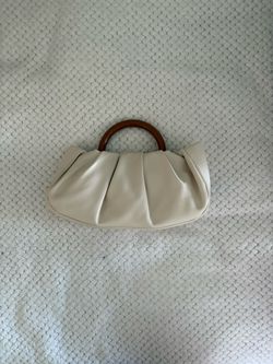 cream & brown clutch bag