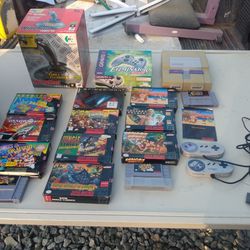 Nintendo Game System And Games Paddless 