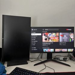   an LG monitor, an hp monitor, a ps4, a MacBook Pro, and an element 40 in tv