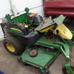 2012 John Deere Zero-turn Mower With Leaf Collector Attachment.