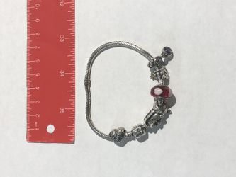 Genuine Pandora bracelet with all charms included