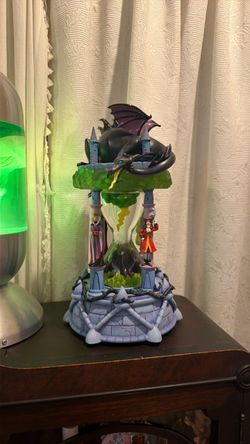 Disney villains snow globe