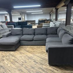 Delivery available gray 4-pc sectional couch
