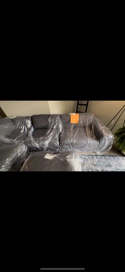 LIVING SPACES SECTIONAL. 5 PC sectional With Ottoman