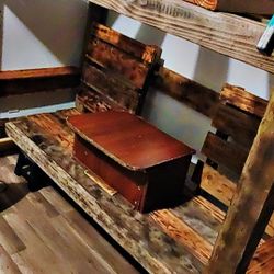 Bunk Bed On The Top And Table And Chairs On The Bottom 