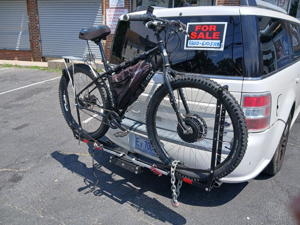 Surge E Mountain Bike With Hitch 4 Travel