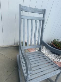 Gray wood rocking chair