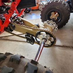 Trx450r Swingarm, Axle, hubs, sprocket, rotor.